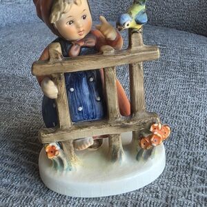 Hummel Figurine with Blue and Orange Accents